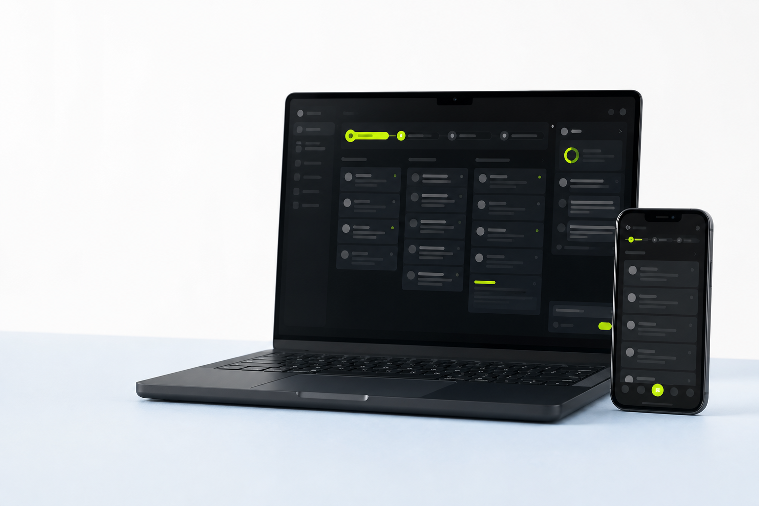 Laptop and phone showing a connected customer workflow